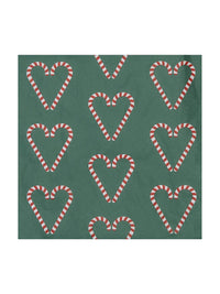 Pattern of red and white candy canes shaped like hearts on a green background