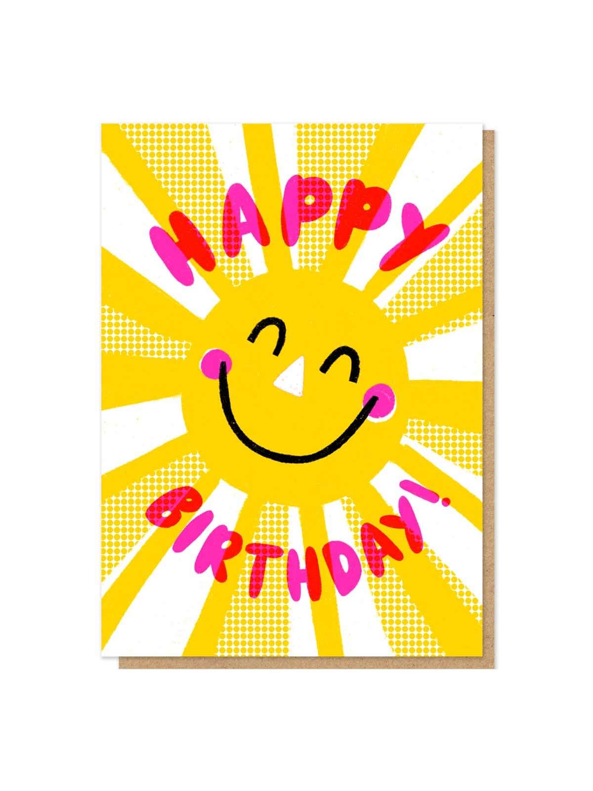 Happy Birthday letterpress card with a smiling sun design on a white background