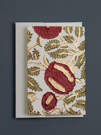 Greeting card with floral design on a gray background