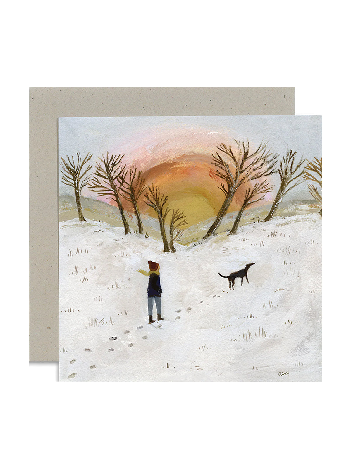 Greeting card with a winter scene of a person and dog walking in the snow, with trees and a sunset in the background.