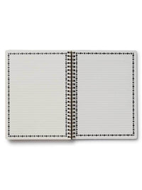 Open notebook with lined pages on a white background