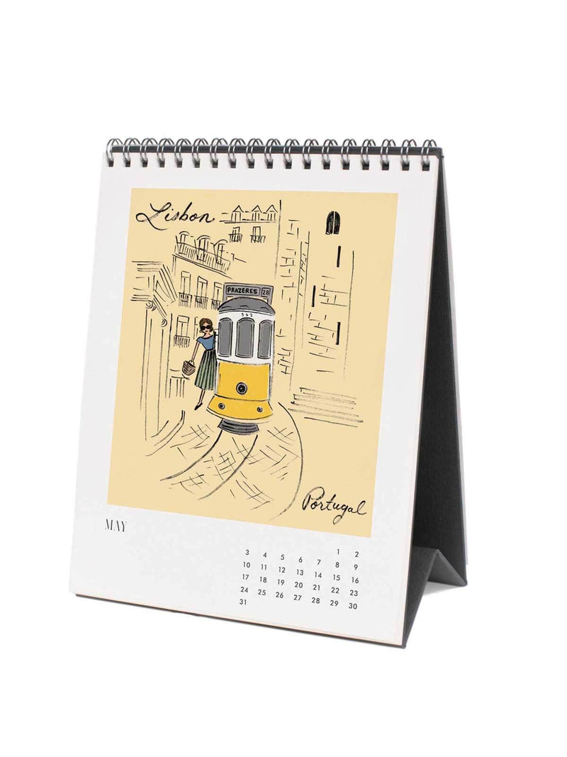 Calendar with illustration of a tram and woman on a white background