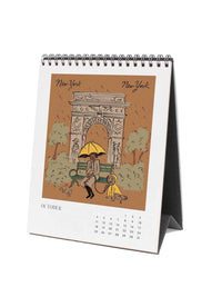 Calendar with illustration of a woman with an umbrella and dog in Central Park, New York