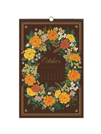 A vertical wall calendar page for October with a dark brown background, surrounded by a large floral wreath in yellow, orange, and green tones. The word 'October' is written in the center above a small monthly calendar grid.