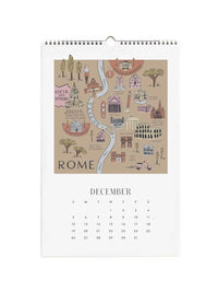 A spiral-bound December Rome calendar page with an illustrated map of Rome on the front and a monthly calendar grid below.