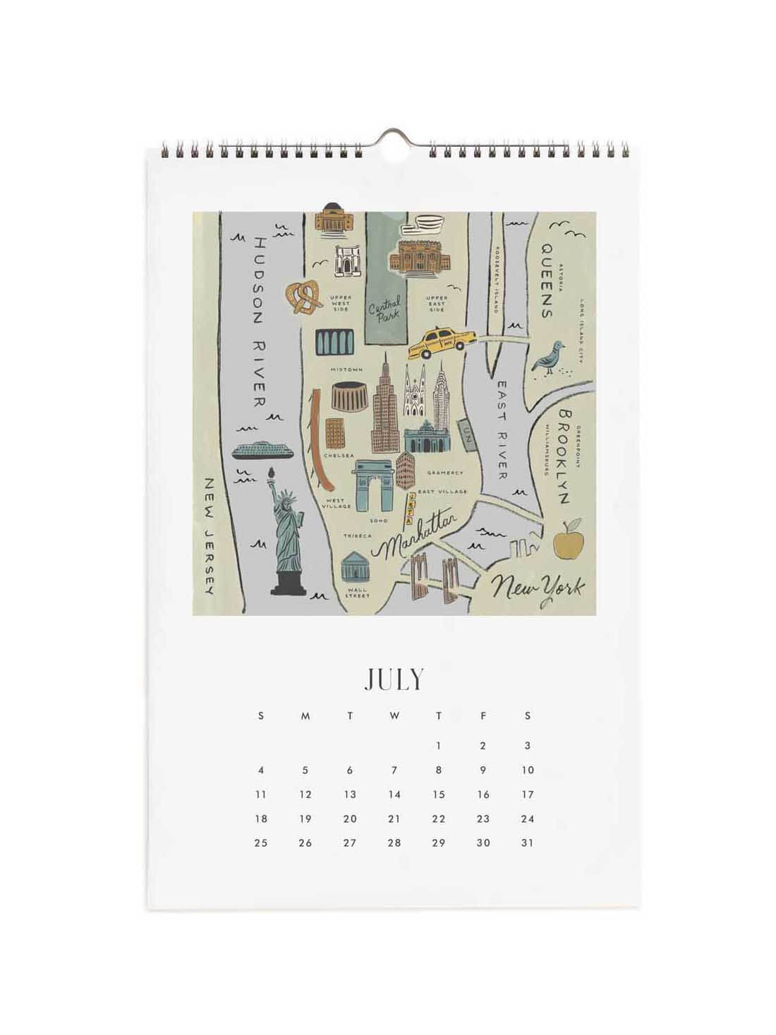 A spiral-bound July calendar page featuring a New York City map illustration with landmarks and a monthly calendar grid below.