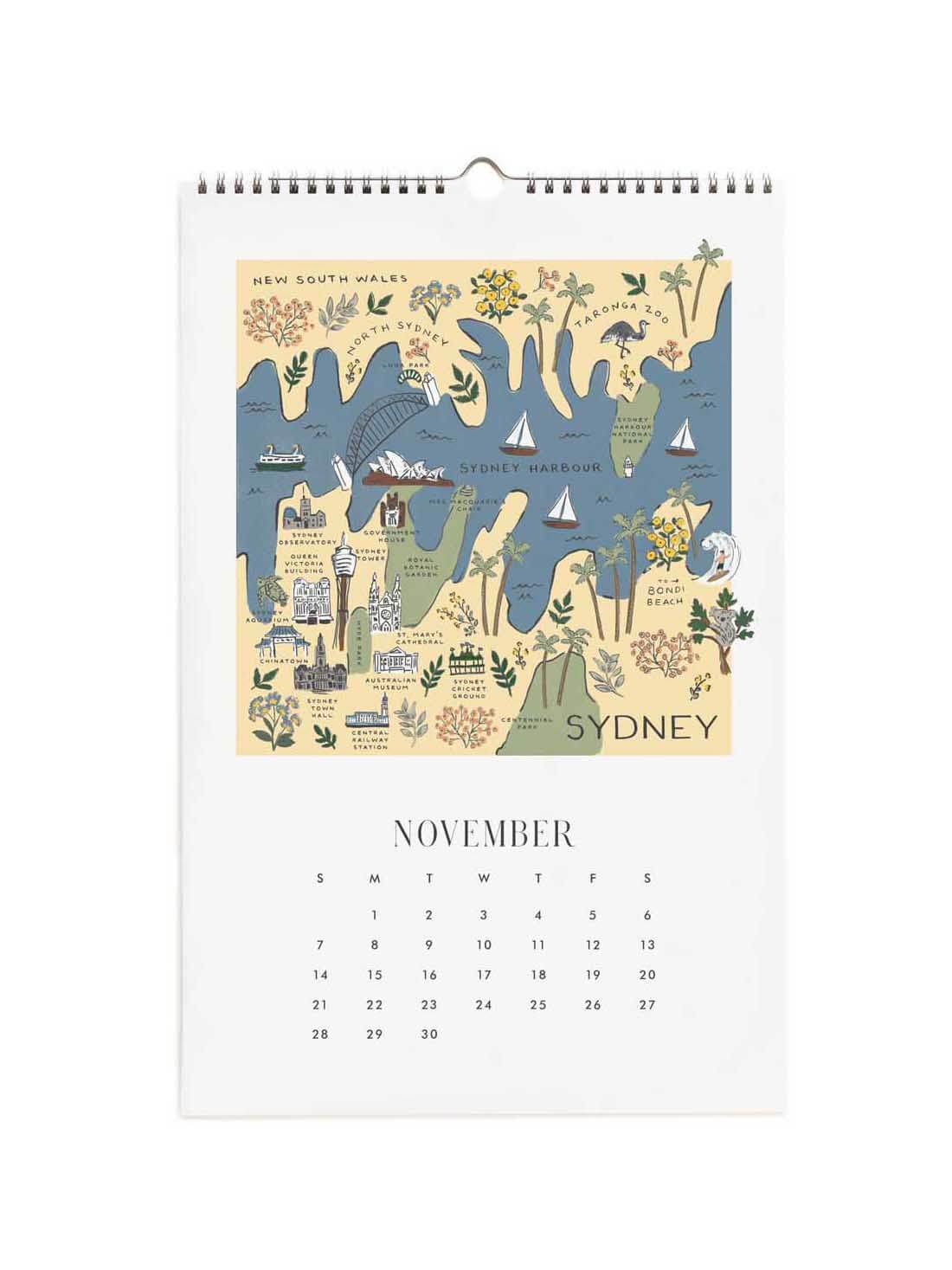 A spiral-bound November calendar page featuring an illustrated map of Sydney, New South Wales, with a calendar grid below on a white background.